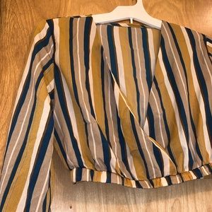 Long sleeve, wrap/plunge neckline, crop blouse